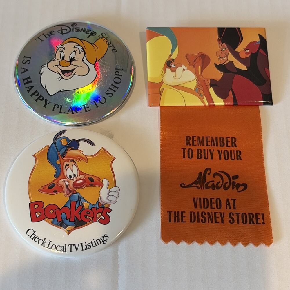 The disney store button pin Lot